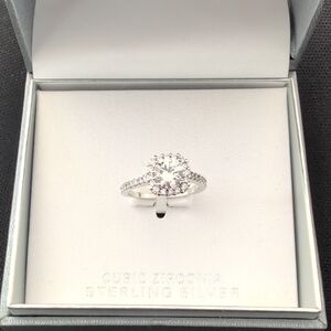 Silver Halo Ring with Pear-Shaped Diamond